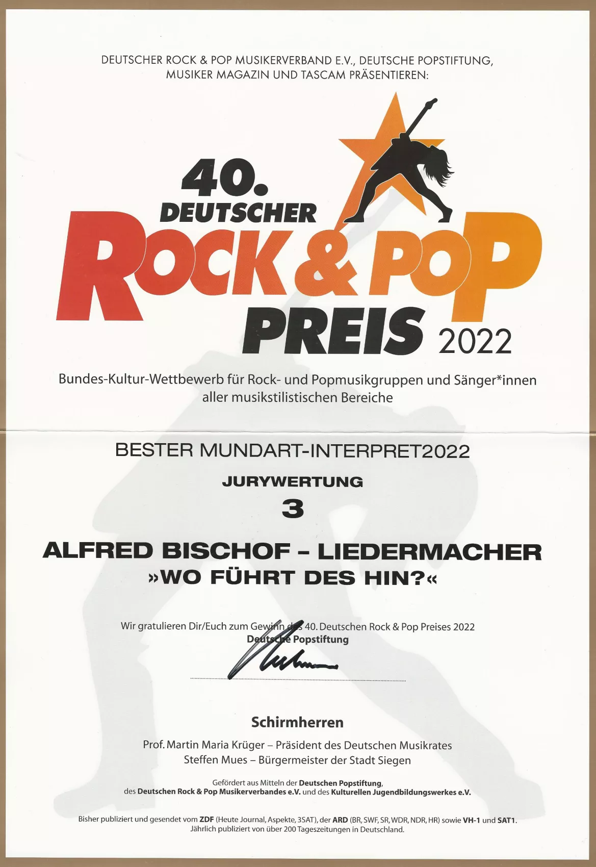 Alfred Bischof erhält 2022 den Preis als bester Mundart-Interpret für den Song „Wo führt des hin“. Alfred Bischof erhält 2022 den Preis als bester Mundart-Interpret für den Song „Wo führt des hin“.
